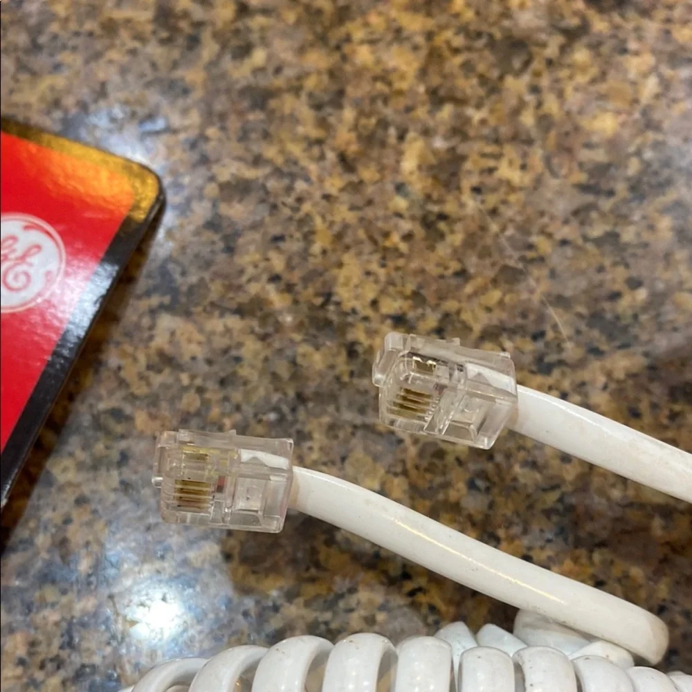 Vintage GE brand White Coil Cord 15 ft. Never used, still in original package.